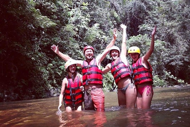 Bali ATV Rafting And Ubud Waterfall Private Tour - ATV riding through jungle, mud, and rice fields