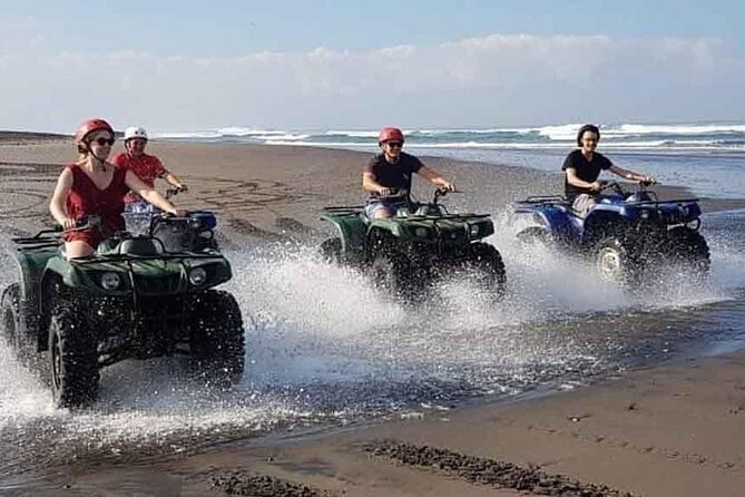 Bali ATV Ride In the beach black sand atv tour - Lunch, drinks, and the value of $49.99