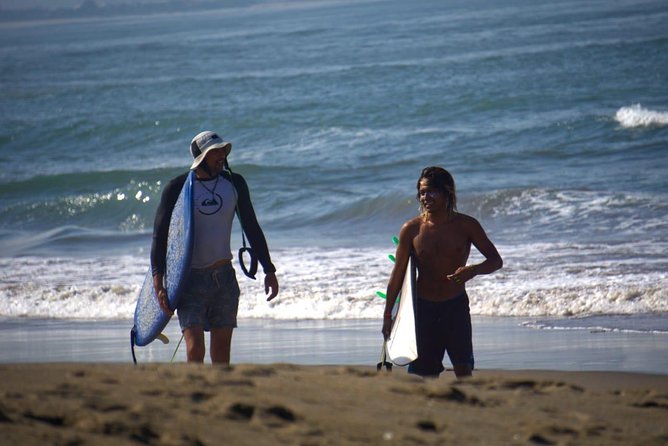 Canggu: Surfing lesson with ISA certified instructor - Getting into the water at Batu Bolong