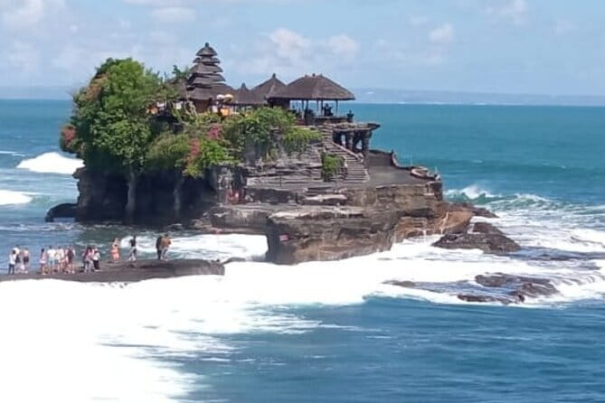 Full Day Private Tour to Ubud Waterfall and Uluwatu Sunset - Uluwatu Temple brings the ocean and sunset