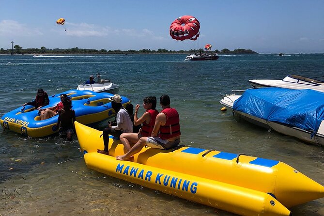 Jet Ski Melasti Beach Uluwatu Kecak Dance Private Guided Tour - Nusa Dua jet skiing on clear water