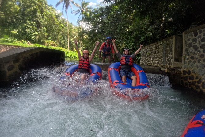 Ubud Tubing Adventure Holy Spring Temple Private Guided Tour - Private transport from Seminyak